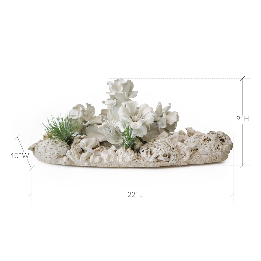 Keystone Sculpture with Porcelain Flowers Plant the Future