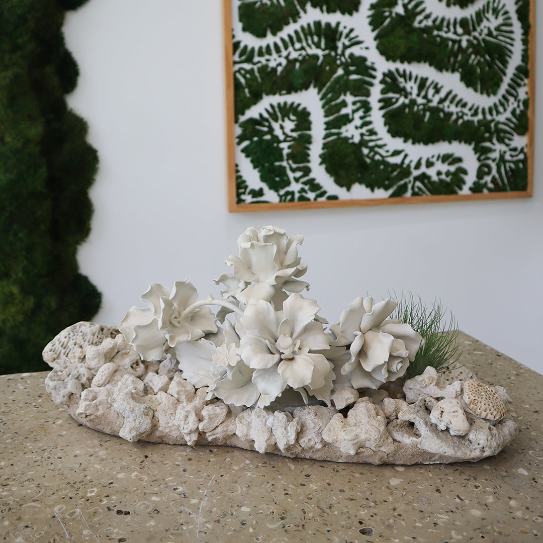 Keystone Sculpture with Porcelain Flowers Plant the Future