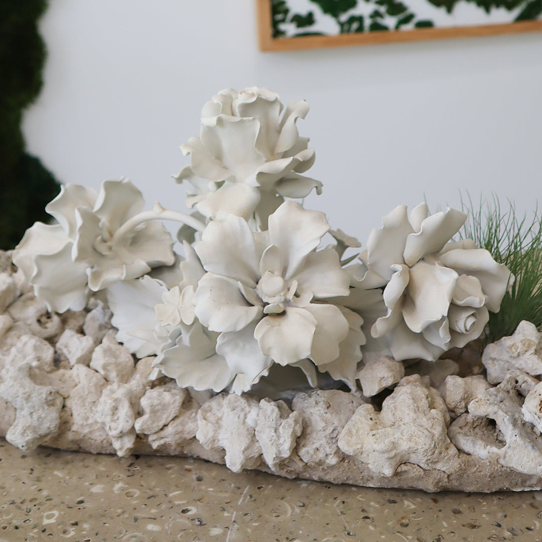 Keystone Sculpture with Porcelain Flowers Plant the Future